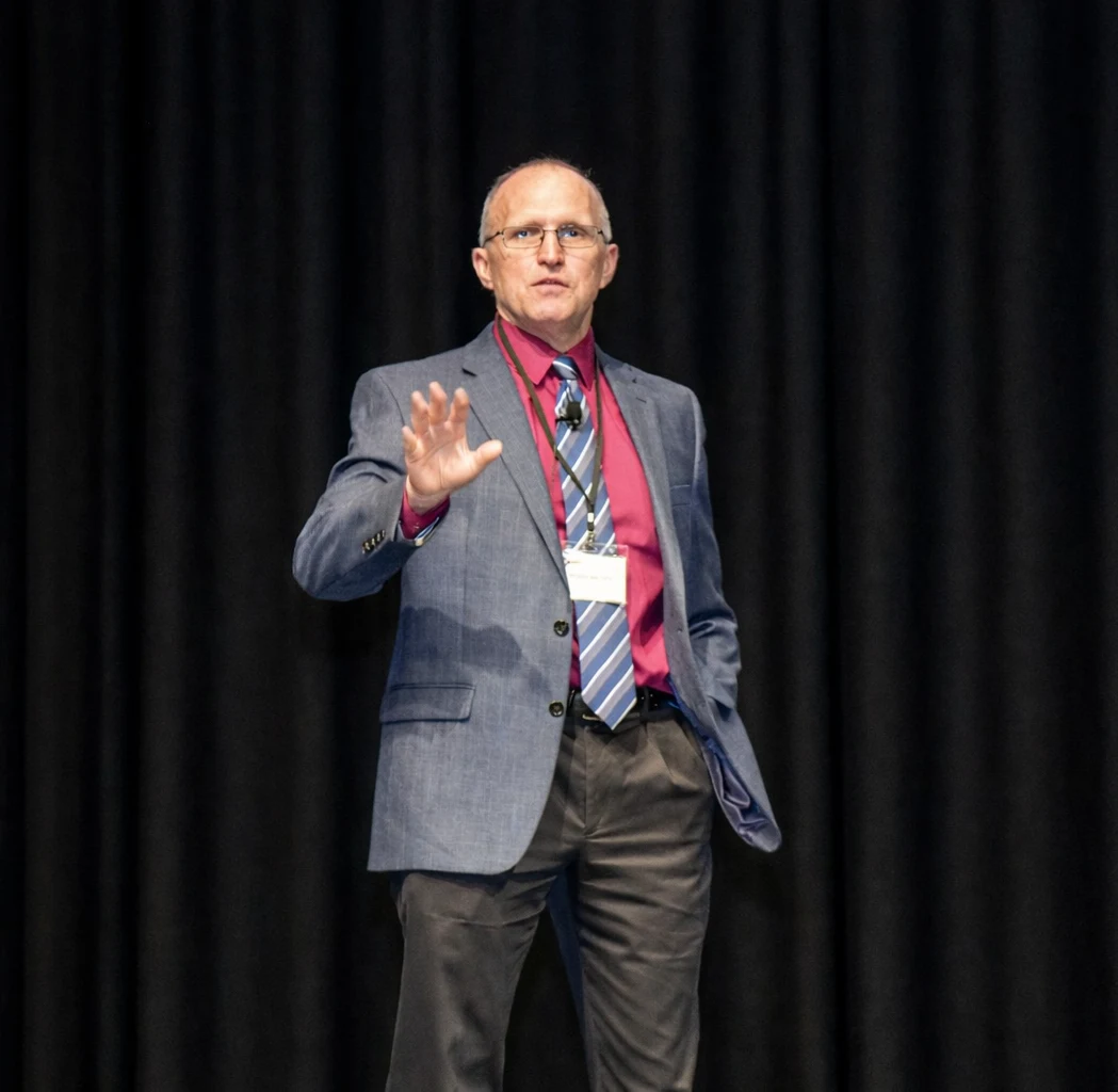 Dr. Donald Murphy presenting at a conference